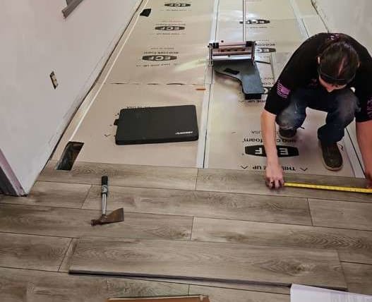 BBB project photo showing flooring installation work in progress